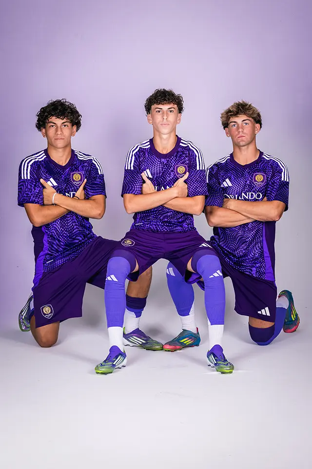 Jose Segura MLS Next academy photo shoot · pose with two other teammates